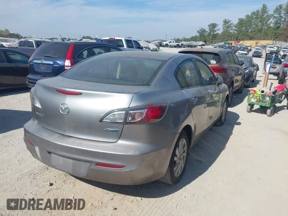 ✅ 2013 Mazda 3 i Touring • VIN: JM1BL1VP0D1772509 • Lot: 43470665. Listed on IAAI with 241,233 mi. Free auction sales archive from the USA and detailed vehicle history report at DreamBid. Image 4.