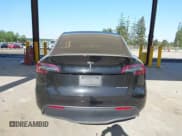 ✅ 2023 Tesla Model Y Long Range • VIN: 7SAYGDEE4PF694216 • Lot: 42180693. Listed on IAAI with 29,303 mi. Free auction sales archive from the USA and detailed vehicle history report at DreamBid. Image 16.