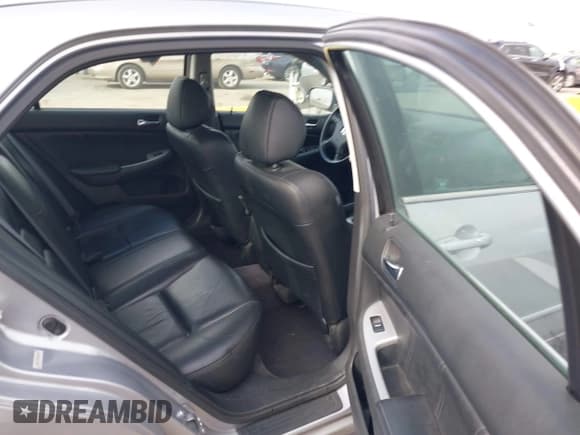 ✅ 2003 Honda Accord EX • VIN: 1HGCM66593A000389 • Lot: 43810844. Listed on IAAI with 294,985 mi. Free auction sales archive from the USA and detailed vehicle history report at DreamBid. Image 8.