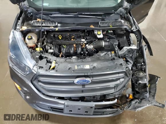 ✅ 2018 Ford Escape S • VIN: 1FMCU0F74JUC76340 • Lot: 86680845. Listed on Copart with 92,128 mi. Free auction sales archive from the USA and detailed vehicle history report at DreamBid. Image 12.