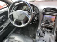 ✅ 2004 Chevrolet Corvette • VIN: 1G1YY32G745122850 • Лот: 65543845. Опубликован ранее на Copart с пробегом 79 354 миль. Бесплатный доступ к архиву аукционных продаж из США и подробный отчёт об истории автомобиля на DreamBid. Изображение 8.