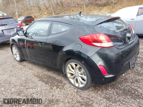 2012 Hyundai Veloster w/Black Int with VIN KMHTC6AD6CU020657, listed as a IAAI auction lot 42031670 with 187,585 mi miles and . Bid and sale history available at DreamBid. Image 3.