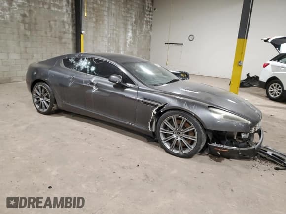 ✅ 2011 Aston Martin Rapide • VIN: SCFHDDAJ0BAF01249 • Lot: 88406885. Wystawiony na Copart z przebiegiem Nie podano. Bezpłatny archiwum sprzedaży aukcyjnych z USA i szczegółowy raport historii pojazdu na DreamBid. Zdjęcie 4.