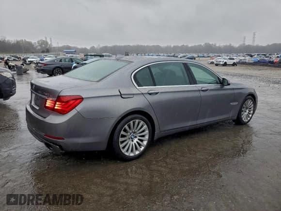 ✅ 2013 BMW 7 Series 750Li • VIN: WBAYE8C55DD132788 • Lot: 93476065. Listed on Copart with 202,553 mi. Free auction sales archive from the USA and detailed vehicle history report at DreamBid. Image 3.