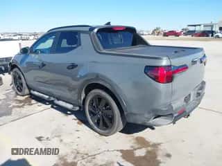 2023 Hyundai Santa Cruz Night Edition с VIN 5NTJCDAF2PH075187, выставлен на аукционе IAAI как лот 41251487 с пробегом 18 028 миль миль и . История ставок и продаж доступна на DreamBid. Изображение 3.