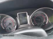 ✅ 2015 Dodge Journey Crossroad • VIN: 3C4PDDGG7FT739701 • Lot: 43513181. Listed on IAAI with 166,113 mi. Free auction sales archive from the USA and detailed vehicle history report at DreamBid. Image 7.