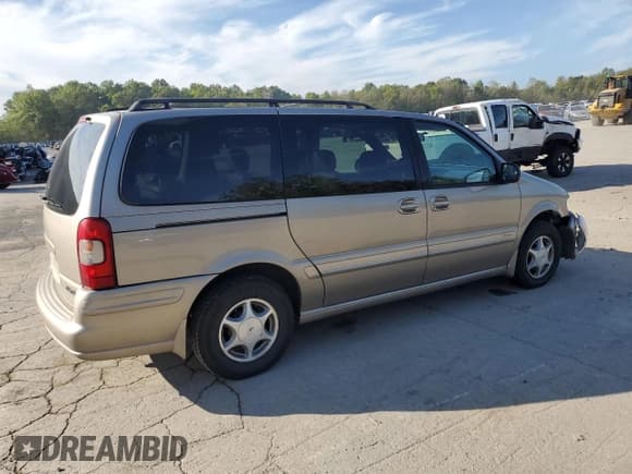 ✅ 1999 Oldsmobile Silhouette GLS • VIN: 1GHDX03E5XD345476 • Lot: 84775675. Listed on Copart with 93,271 mi. Free auction sales archive from the USA and detailed vehicle history report at DreamBid. Image 3.