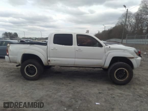 ✅ 2005 Toyota Tacoma PreRunner • VIN: 3TMJU62N75M001963 • Lot: 41554786. Wystawiony na IAAI z przebiegiem 197 000 mil. Bezpłatny archiwum sprzedaży aukcyjnych z USA i szczegółowy raport historii pojazdu na DreamBid. Zdjęcie 13.
