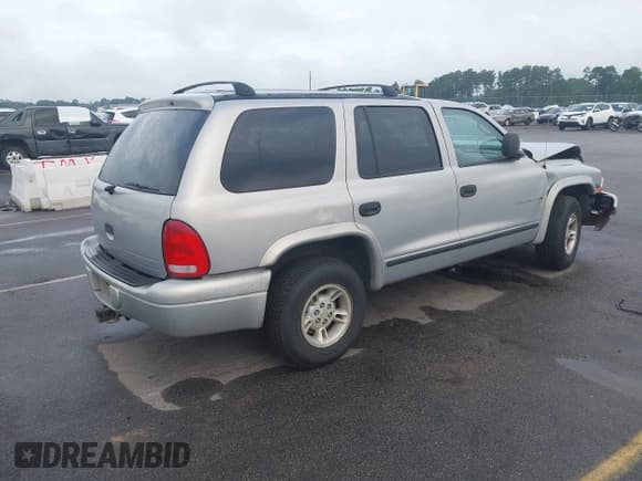 ✅ 1999 Dodge Durango • VIN: 1B4HR28Y4XF659931 • Lot: 43051060. Wystawiony na IAAI z przebiegiem 271 761 mil. Bezpłatny archiwum sprzedaży aukcyjnych z USA i szczegółowy raport historii pojazdu na DreamBid. Zdjęcie 4.