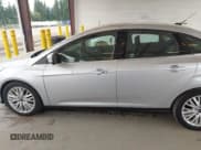✅ 2017 Ford Focus Titanium • VIN: 1FADP3J29HL329410 • Lot: 42493519. Listed on IAAI with 22,639 mi. Free auction sales archive from the USA and detailed vehicle history report at DreamBid. Image 14.