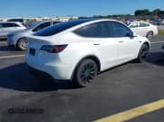 ✅ 2022 Tesla Model Y Long Range • VIN: 7SAYGDEE2NF385647 • Lot: 43434361. Wystawiony na IAAI z przebiegiem 86 365 mil. Bezpłatny archiwum sprzedaży aukcyjnych z USA i szczegółowy raport historii pojazdu na DreamBid. Zdjęcie 4.