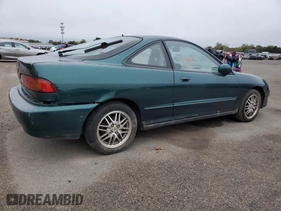 ✅ 1999 Acura Integra LS • VIN: JH4DC4457XS000936 • Lot: 72347504. Listed on Copart with 131,036 mi. Free auction sales archive from the USA and detailed vehicle history report at DreamBid. Image 3.