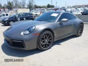 ✅ 2022 Porsche 911 Carrera • VIN: WP0AA2A94NS205939 • Lot: 42204771. Listed on IAAI with 14,853 mi. Free auction sales archive from the USA and detailed vehicle history report at DreamBid. Image 2.