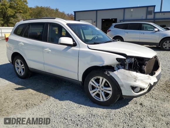 ✅ 2012 Hyundai Santa Fe SE • VIN: 5XYZH4AG4CG110518 • Lot: 77423244. Listed on Copart with 170,903 mi. Free auction sales archive from the USA and detailed vehicle history report at DreamBid. Image 4.