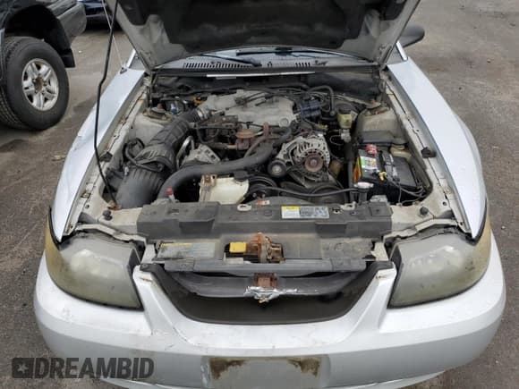 ✅ 2004 Ford Mustang Deluxe • VIN: 1FAFP44614F132706 • Лот: 80920275. Опубликован ранее на Copart с пробегом 137 564 миль. Бесплатный доступ к архиву аукционных продаж из США и подробный отчёт об истории автомобиля на DreamBid. Изображение 11.