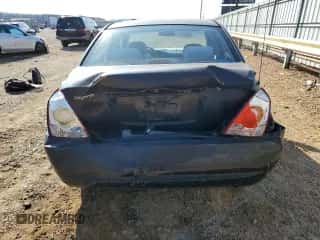 2005 Hyundai Elantra GLS z VIN KMHDN46D75U073124, wystawiony jako Copart lot #79724164 z przebiegiem 197 628 mil mil oraz Szkoda całkowita • Salvage title. Historia ofert i sprzedaży dostępna na DreamBid. Obrazek 6.