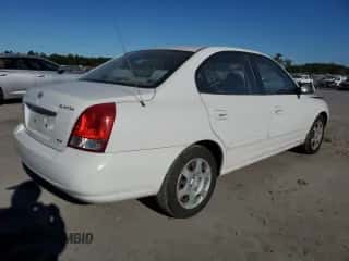 2003 Hyundai Elantra GLS z VIN KMHDN45D13U521386, wystawiony jako Copart lot #75726144 z przebiegiem 169 663 mil mil oraz Szkoda całkowita • Salvage title. Historia ofert i sprzedaży dostępna na DreamBid. Obrazek 3.