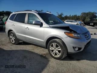 ✅ 2010 Hyundai Santa Fe SE • VIN: 5NMSH4AG2AH393103 • Lot: 81256834. Listed on Copart with 121,435 mi. Free auction sales archive from the USA and detailed vehicle history report at DreamBid. Image 4.