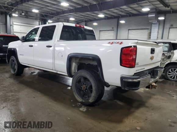 2015 Chevrolet Silverado 2500HD Work Truck z VIN 1GC1KUEG0FF623247, wystawiony jako Copart lot #55618025 z przebiegiem 165 890 mil mil oraz Szkoda całkowita • Salvage title. Historia ofert i sprzedaży dostępna na DreamBid. Obrazek 2.