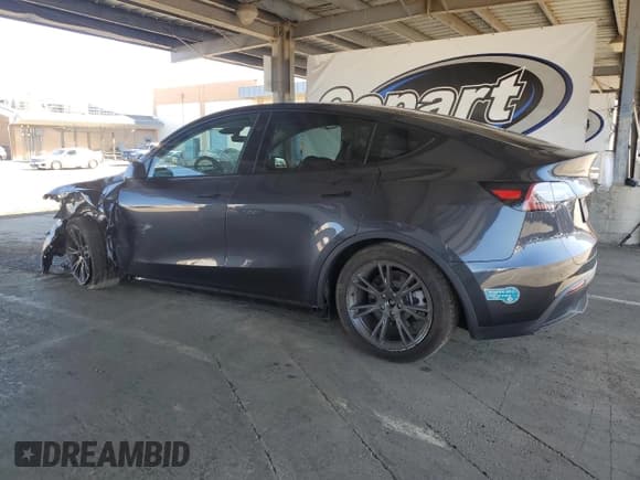 ✅ 2025 Tesla Model Y Long Range • VIN: 7SAYGDED5SF259138 • Лот: 82620725. Опубликован ранее на Copart с пробегом 7 829 миль. Бесплатный доступ к архиву аукционных продаж из США и подробный отчёт об истории автомобиля на DreamBid. Изображение 2.