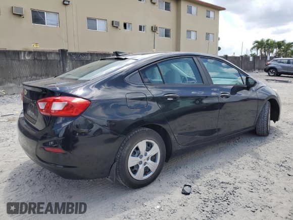 ✅ 2016 Chevrolet Cruze LS • VIN: 1G1BC5SM4G7297507 • Lot: 49623263. Listed on Copart with 73,042 mi. Free auction sales archive from the USA and detailed vehicle history report at DreamBid. Image 3.
