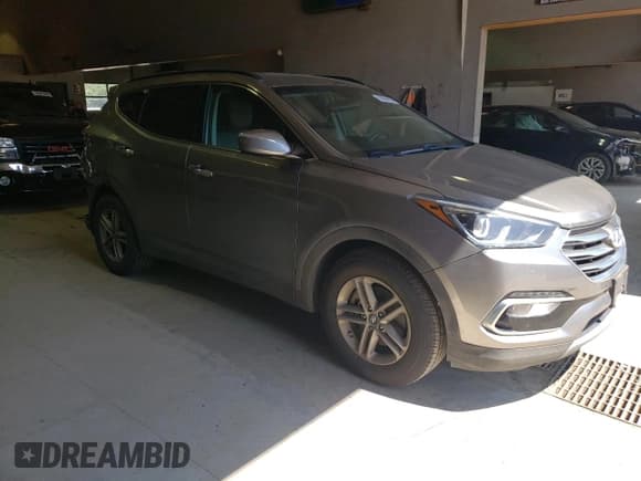 ✅ 2018 Hyundai Santa Fe 2.4L • VIN: 5XYZUDLBXJG532383 • Лот: 50864484. Опубликован ранее на Copart с пробегом 76 124 миль. Бесплатный доступ к архиву аукционных продаж из США и подробный отчёт об истории автомобиля на DreamBid. Изображение 4.