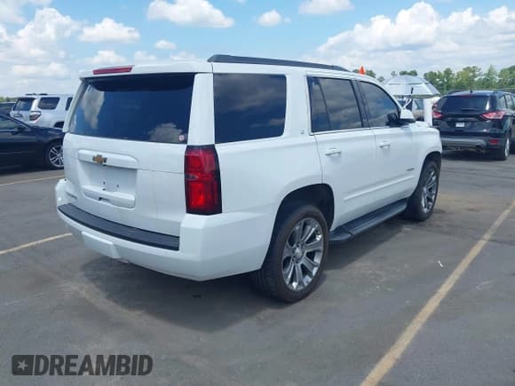 ✅ 2017 Chevrolet Tahoe LT • VIN: 1GNSCBKC4HR288848 • Lot: 42806850. Listed on IAAI with 133,190 mi. Free auction sales archive from the USA and detailed vehicle history report at DreamBid. Image 4.