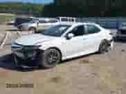 2023 Toyota Camry SE with VIN 4T1G11BK6PU100117, listed as a IAAI auction lot 43194290 with 54,061 mi miles and . Bid and sale history available at DreamBid. Image 2.