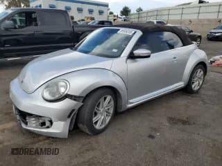 ✅ 2014 Volkswagen Beetle 1.8T • VIN: 3VW507ATXEM823687 • Lot: 65508205. Listed on Copart with Not provided. Free auction sales archive from the USA and detailed vehicle history report at DreamBid. Image 1.