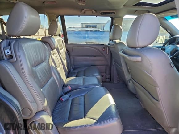 ✅ 2010 Honda Odyssey EX-L • VIN: 5FNRL3H68AB034103 • Lot: 95981635. Listed on Copart with 126,963 mi. Free auction sales archive from the USA and detailed vehicle history report at DreamBid. Image 11.
