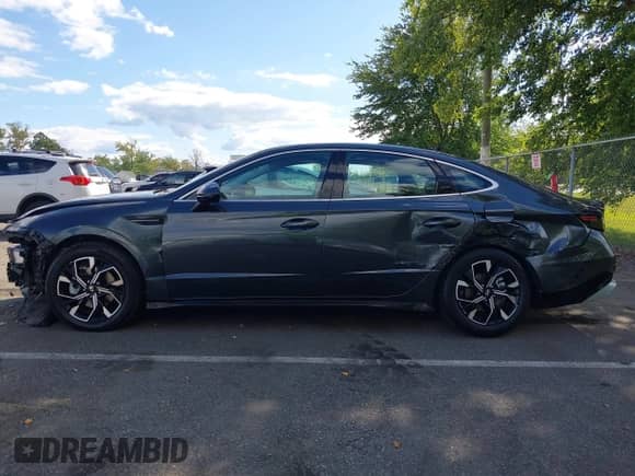 2024 Hyundai Sonata SEL z VIN KMHL64JA1RA411582, wystawiony jako IAAI lot #43092557 z przebiegiem 14 411 mil mil oraz . Historia ofert i sprzedaży dostępna na DreamBid. Obrazek 14.