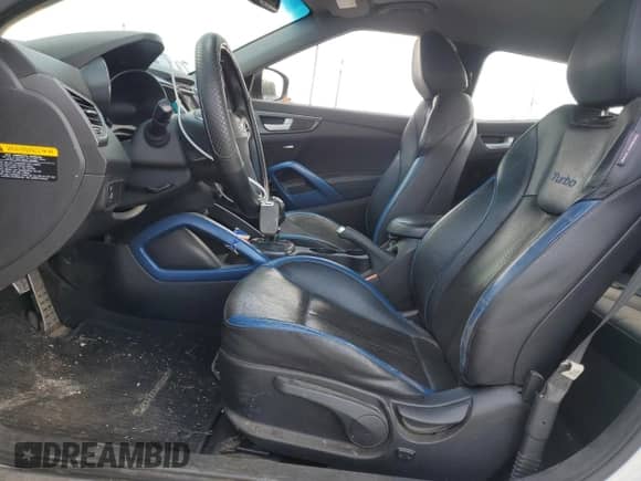 2013 Hyundai Veloster Turbo с VIN KMHTC6AE9DU171583, выставлен на аукционе Copart как лот 67222235 с пробегом 148 246 миль миль и Списание • Salvage title. История ставок и продаж доступна на DreamBid. Изображение 7.