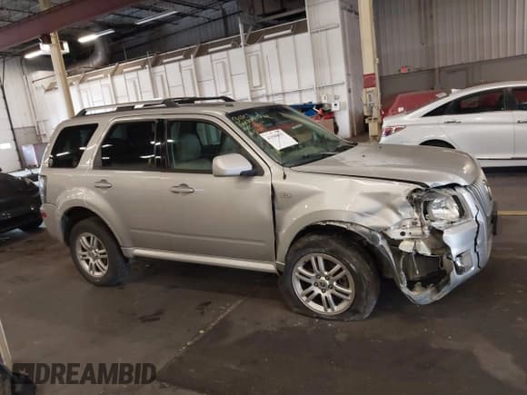 ✅ 2009 Mercury Mariner Premier • VIN: 4M2CU97799KJ18651 • Lot: 43508657. Wystawiony na IAAI z przebiegiem 150 261 mil. Bezpłatny archiwum sprzedaży aukcyjnych z USA i szczegółowy raport historii pojazdu na DreamBid. Zdjęcie 13.