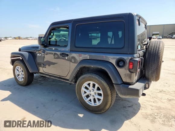 ✅ 2023 Jeep Wrangler Sport S • VIN: 1C4GJXAN6PW671629 • Lot: 65751245. Listed on Copart with 31,740 mi. Free auction sales archive from the USA and detailed vehicle history report at DreamBid. Image 2.