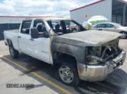 ✅ 2015 Chevrolet Silverado 2500HD Work Truck • VIN: 1GC1KUEG0FF129924 • Lot: 42050402. Listed on IAAI with 162,472 mi. Free auction sales archive from the USA and detailed vehicle history report at DreamBid. Image 1.