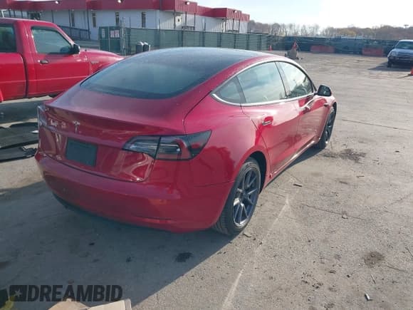 ✅ 2021 Tesla Model 3 Standard Range Plus • VIN: 5YJ3E1EA7MF943046 • Lot: 43677750. Listed on IAAI with 21,781 mi. Free auction sales archive from the USA and detailed vehicle history report at DreamBid. Image 4.