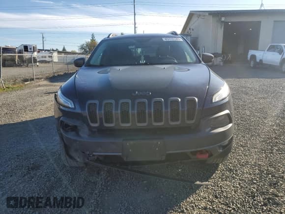✅ 2014 Jeep Cherokee Trailhawk • VIN: 1C4PJMBBXEW162594 • Lot: 89446585. Listed on Copart with 141,879 mi. Free auction sales archive from the USA and detailed vehicle history report at DreamBid. Image 5.
