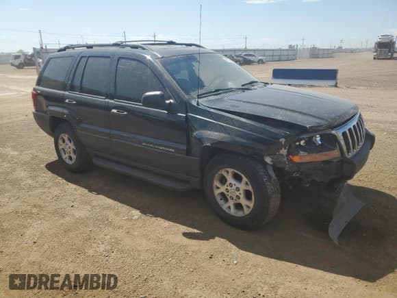 ✅ 2000 Jeep Grand Cherokee Laredo • VIN: 1J4GW48N0YC210235 • Lot: 60558905. Listed on Copart with 131,108 mi. Free auction sales archive from the USA and detailed vehicle history report at DreamBid. Image 4.