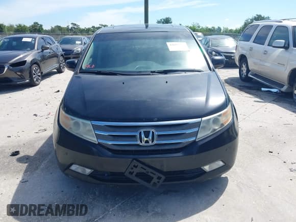 ✅ 2011 Honda Odyssey Touring • VIN: 5FNRL5H94BB508457 • Lot: 42607918. Listed on IAAI with 490,827 mi. Free auction sales archive from the USA and detailed vehicle history report at DreamBid. Image 12.