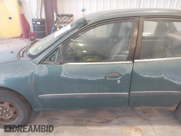 ✅ 1998 Chevrolet Metro Lsi • VIN: 2C1MR5225W6734147 • Лот: 43727340. Опубликован ранее на IAAI с пробегом 213 033 миль. Бесплатный доступ к архиву аукционных продаж из США и подробный отчёт об истории автомобиля на DreamBid. Изображение 6.