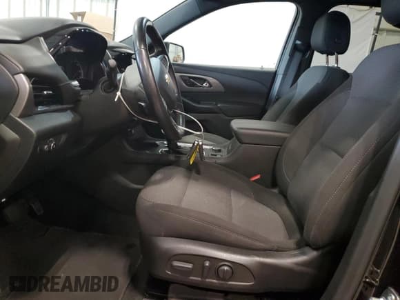 ✅ 2023 Chevrolet Traverse LT Cloth • VIN: 1GNERGKW1PJ166156 • Lot: 71117785. Wystawiony na Copart z przebiegiem 70 414 mil. Bezpłatny archiwum sprzedaży aukcyjnych z USA i szczegółowy raport historii pojazdu na DreamBid. Zdjęcie 7.
