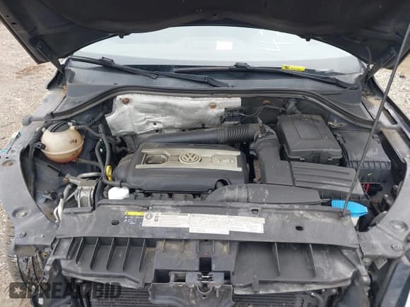 ✅ 2014 Volkswagen Tiguan S • VIN: WVGBV3AX4EW502887 • Лот: 42876896. Опубликован ранее на IAAI с пробегом 141 829 миль. Бесплатный доступ к архиву аукционных продаж из США и подробный отчёт об истории автомобиля на DreamBid. Изображение 10.