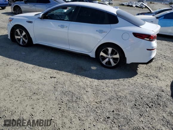 ✅ 2019 Kia Optima LX • VIN: 5XXGT4L30KG309956 • Lot: 81829505. Wystawiony na Copart z przebiegiem 99 432 mil. Bezpłatny archiwum sprzedaży aukcyjnych z USA i szczegółowy raport historii pojazdu na DreamBid. Zdjęcie 2.