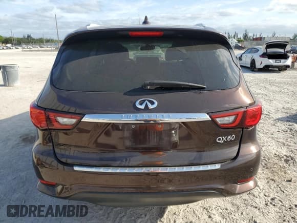 ✅ 2019 Infiniti QX60 Pure • VIN: 5N1DL0MN5KC565811 • Lot: 54730725. Listed on Copart with 87,001 mi. Free auction sales archive from the USA and detailed vehicle history report at DreamBid. Image 6.