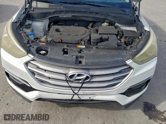 ✅ 2017 Hyundai Santa Fe 2.4L • VIN: 5XYZT3LB2HG403741 • Лот: 96082615. Опубликован ранее на Copart с пробегом 205 136 миль. Бесплатный доступ к архиву аукционных продаж из США и подробный отчёт об истории автомобиля на DreamBid. Изображение 12.