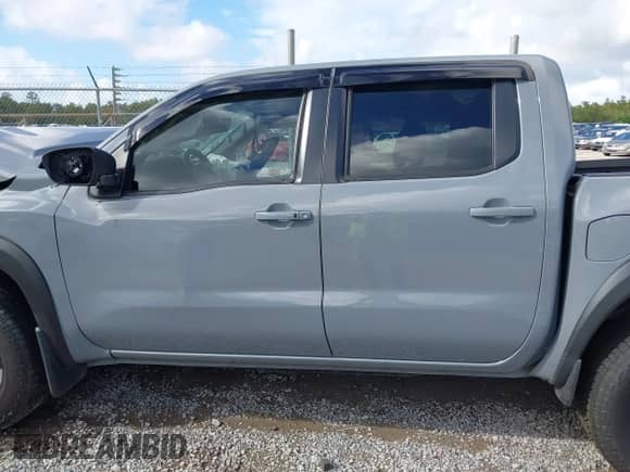 2022 Nissan Frontier Pro-4X z VIN 1N6ED1EK0NN620249, wystawiony jako IAAI lot #43387462 z przebiegiem 92 659 mil mil oraz . Historia ofert i sprzedaży dostępna na DreamBid. Obrazek 13.