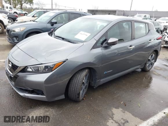 ✅ 2018 Nissan LEAF SV • VIN: 1N4AZ1CP2JC304719 • Лот: 41629796. Опубликован ранее на IAAI с пробегом 49 806 миль. Бесплатный доступ к архиву аукционных продаж из США и подробный отчёт об истории автомобиля на DreamBid. Изображение 2.