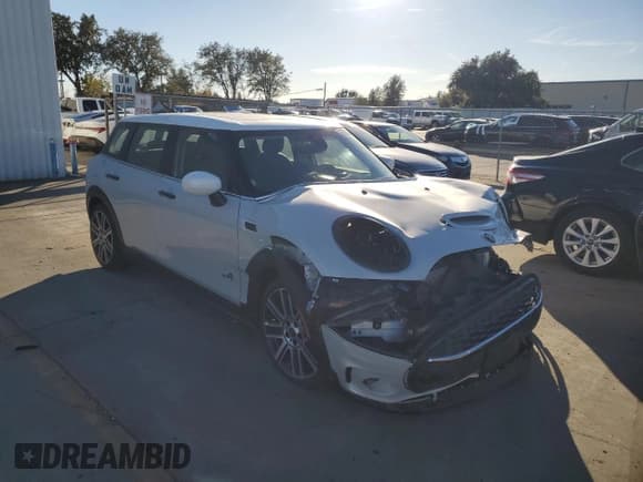 ✅ 2022 MINI Clubman Cooper S • VIN: WMWXJ1C06N2P82102 • Lot: 79389094. Listed on Copart with 6,401 mi. Free auction sales archive from the USA and detailed vehicle history report at DreamBid. Image 4.