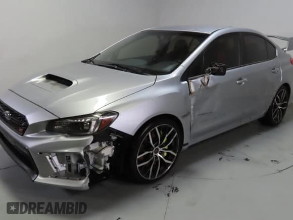 ✅ 2021 Subaru WRX STI • VIN: JF1VA2E68M9804971 • Lot: 93673995. Listed on Copart with 42,598 mi. Free auction sales archive from the USA and detailed vehicle history report at DreamBid. Image 2.
