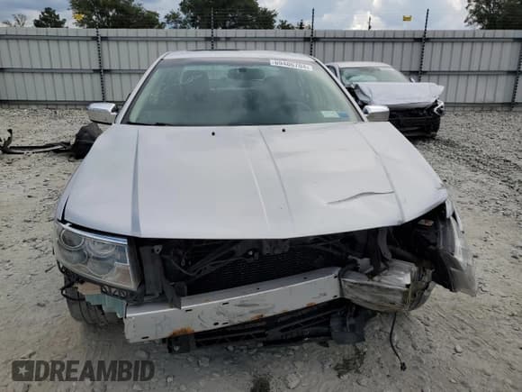 ✅ 2009 Lincoln MKZ • VIN: 3LNHM28T99R605435 • Lot: 84745495. Wystawiony na Copart z przebiegiem 194 510 mil. Bezpłatny archiwum sprzedaży aukcyjnych z USA i szczegółowy raport historii pojazdu na DreamBid. Zdjęcie 5.